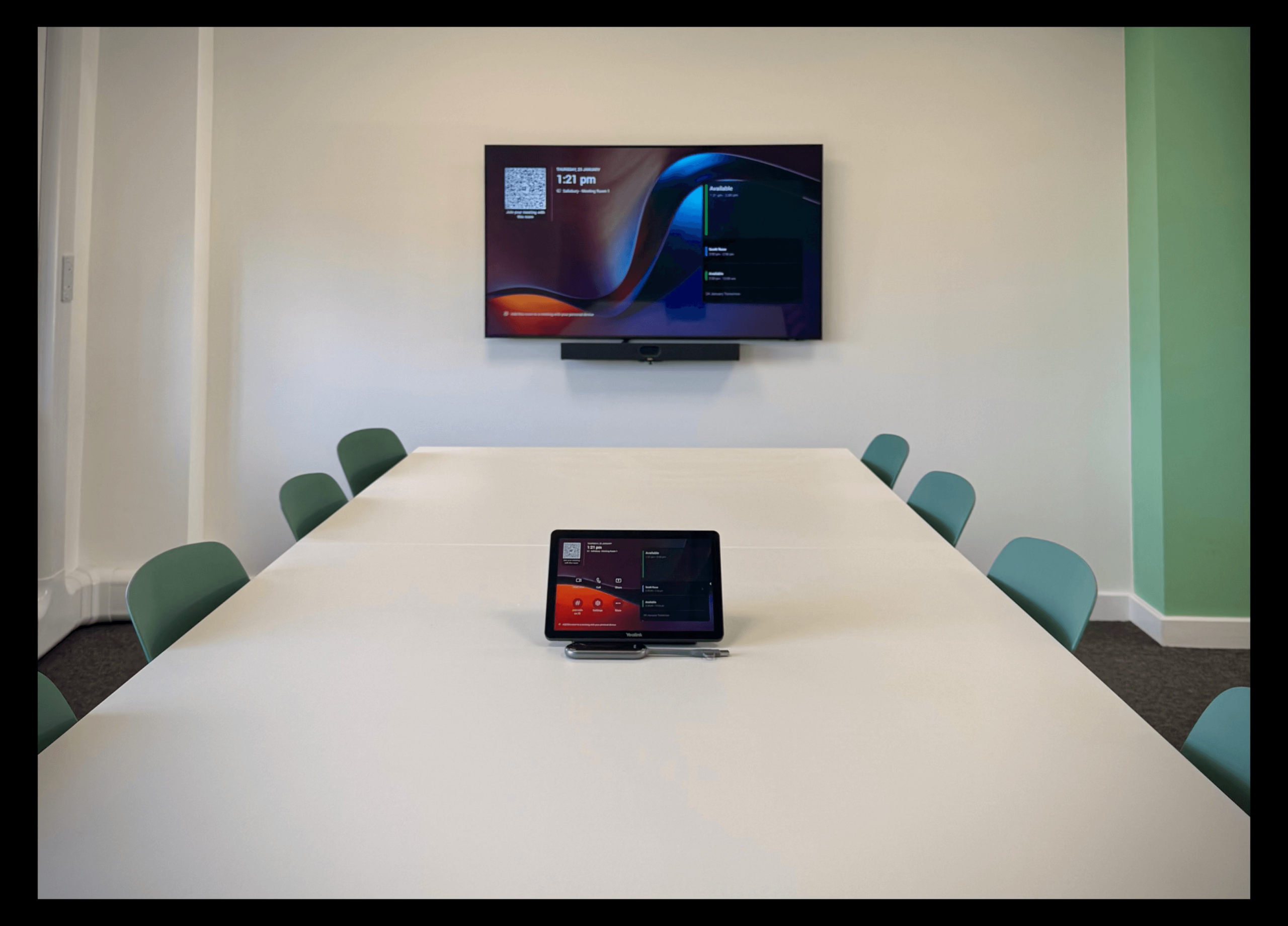 medium sized microsoft teams room set up with yealink equipment