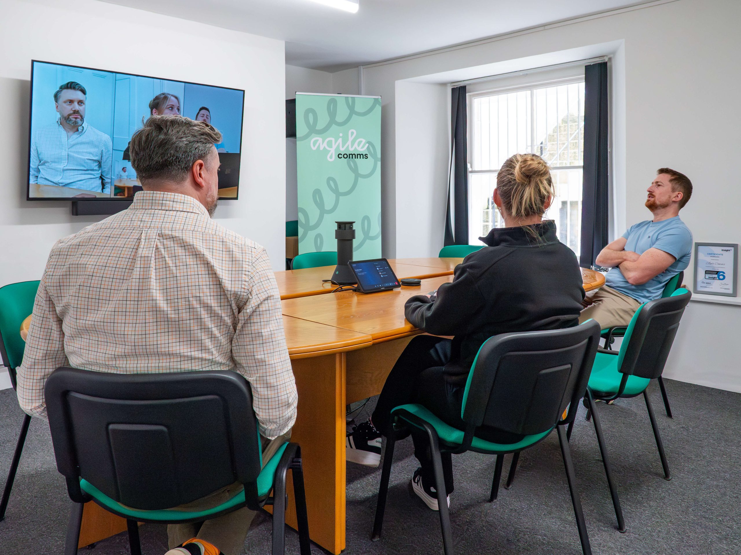 James, Aimee and Ollie in an internal meeting