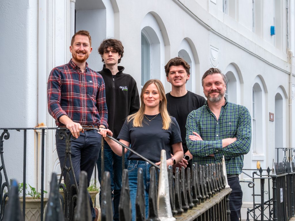 Agile team picture outside of their office in Plymouth